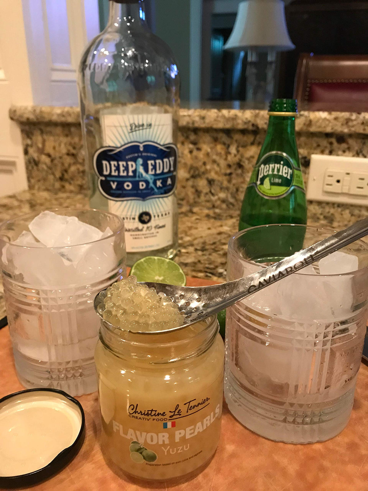 Christine Le Tennier Yuzu Pearls bottle pour showcases citrus flavor for drinks and dishes.