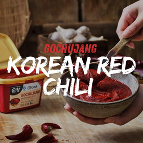 Closeup of glossy fermented gochujang in the jar by Chung Jung One