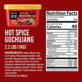 Scooping O’Food gochujang to add bold, balanced heat to a recipe