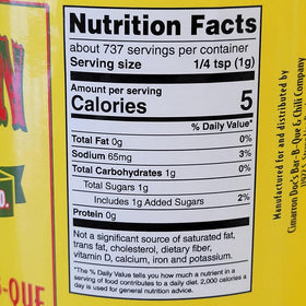 Close-up of Cimarron Docs Sweet Rib Rub jar label, award-winning seasoning for pork.