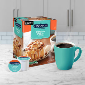 Aromas rise from CINNABON caramel pecan coffee in a steaming mug.