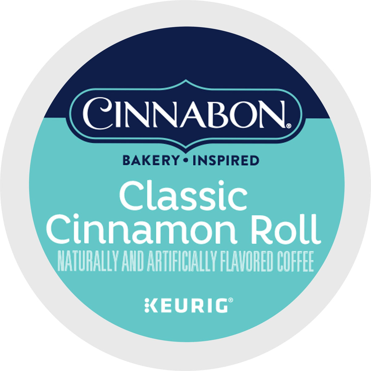 Lifestyle shot of CINNABON box, mug, and cinnamon ambiance.