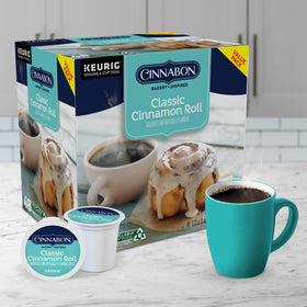 Office desk with CINNABON K-Cups for a quick energy boost.