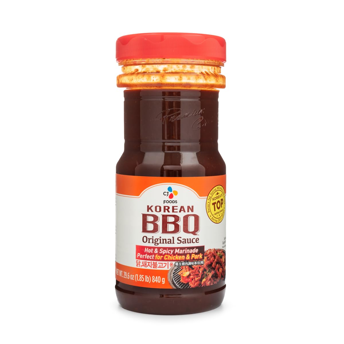 CJ Hot and Spicy Korean BBQ Original Marinade bottle pour enhances chicken and pork glaze.