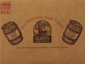 Close-up of Claey's Root Beer Drops texture, glossy and inviting.