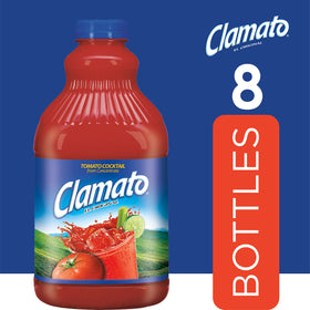Clamato Original bottle beside a glass, perfect Michelada base for beer cocktails.