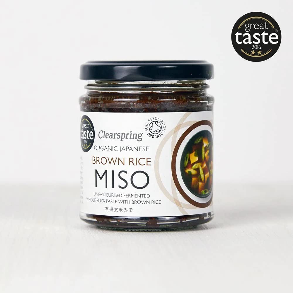 Clearspring Genmai miso jar pour demonstrates versatile use in soups and sauces.