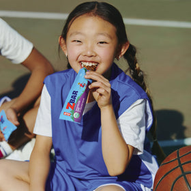 Clif Kid ZBar chocolate chips visible in a close-up, tasty playtime treat
