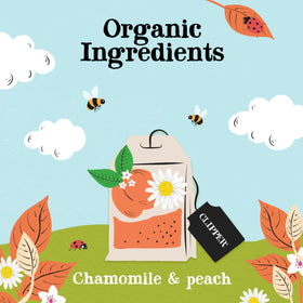 Closeup of chamomile flowers and peach pieces in Clipper Tea Chamomile & Peach.
