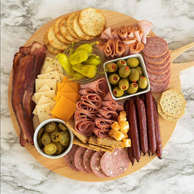 Cloverdale Tangy Summer Sausage slices on plate for quick tasting.