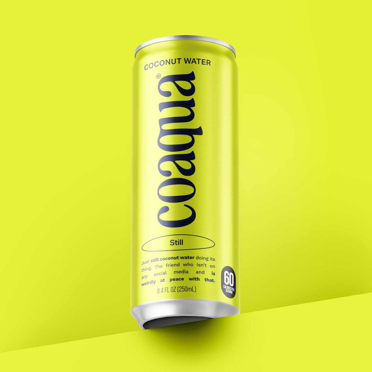 CoAqua vegan coconut water on kitchen counter, non-GMO.