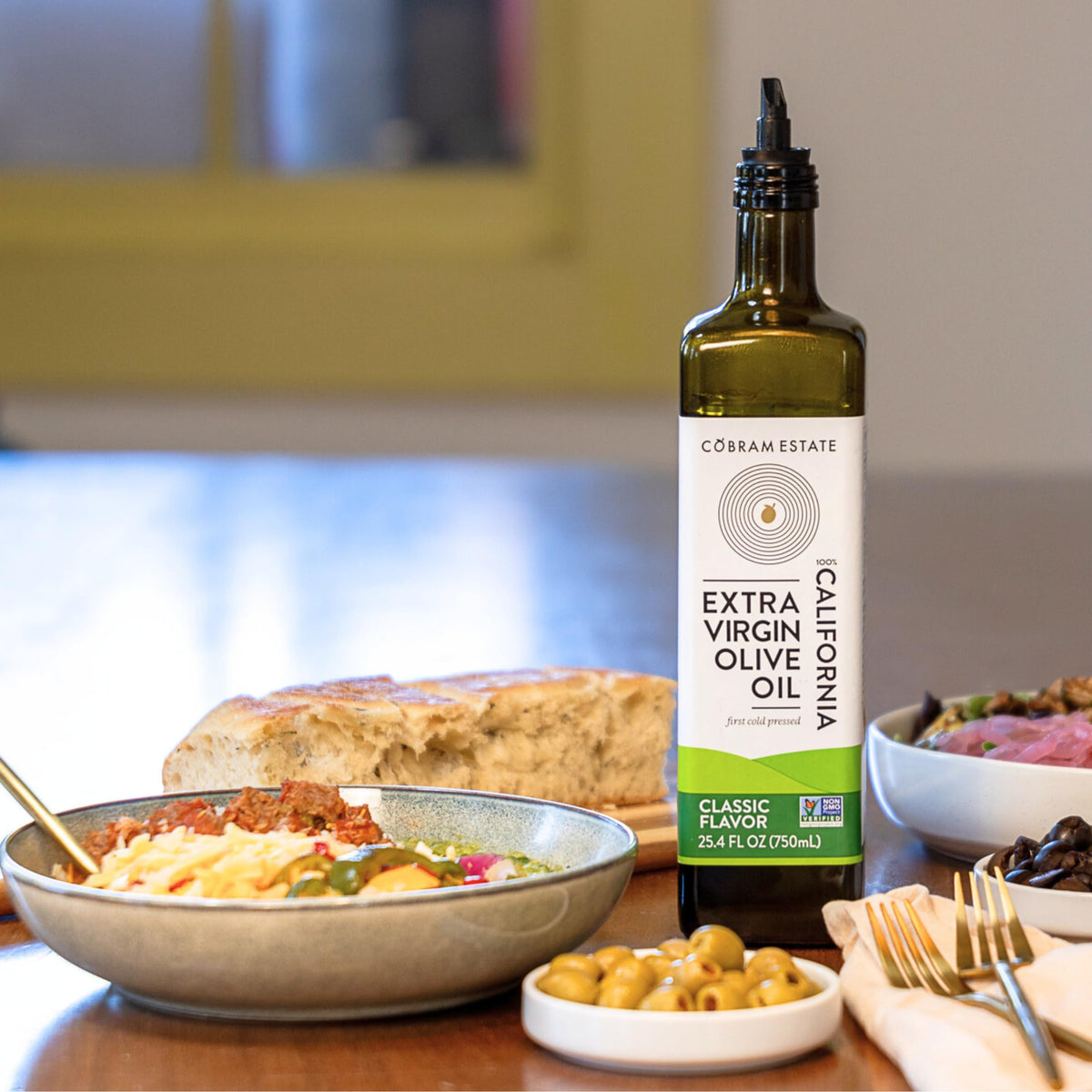 Cobram Estate Classic olive oil pouring glass for drizzle over warm dishes.