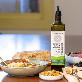 Cobram Estate Classic olive oil pouring glass for drizzle over warm dishes.