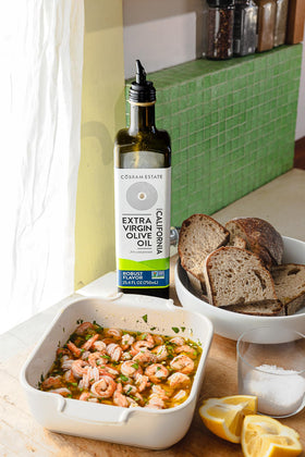 Cobram Estate spicy fruity leafy profile shown in bottle.