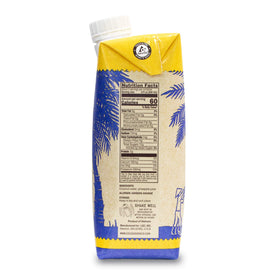 Chilled COCOGOODSCO bottle resting on a shelf ready for grab-and-go