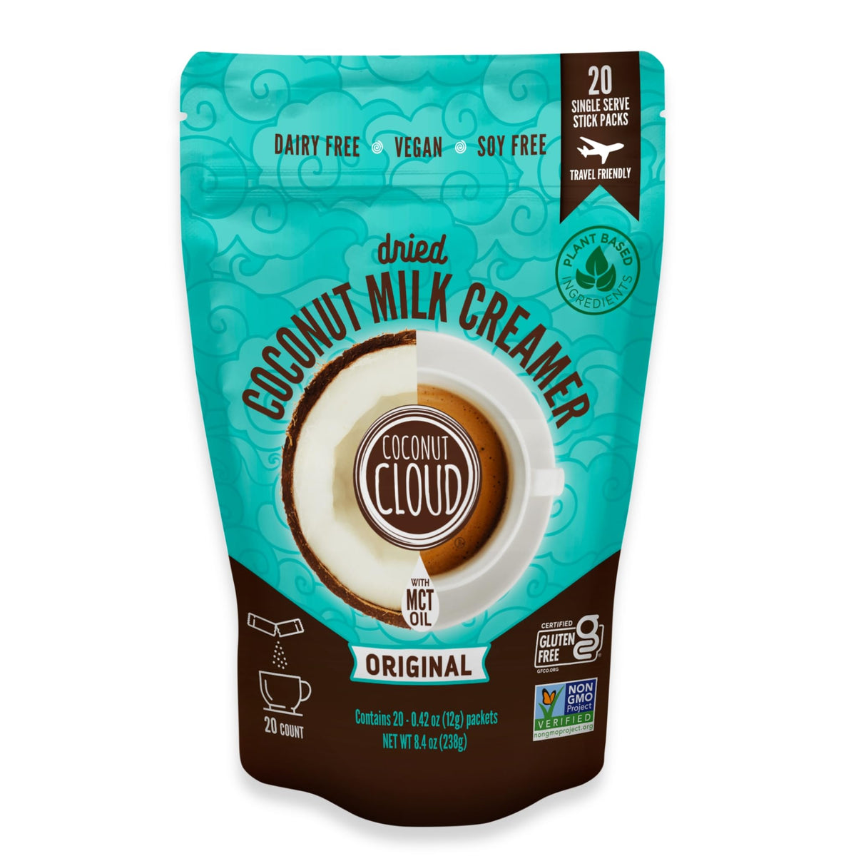 Coconut Cloud dairy-free creamer powder ready to mix into coffee for creaminess.