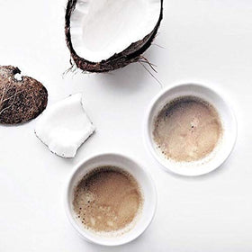 Cozy morning setup with Coconut Cloud creamer and steaming cup