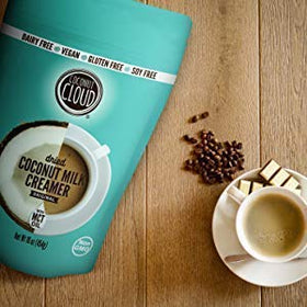 Coconut Cloud Original Coffee Creamer in mug steaming, inviting creamy aroma
