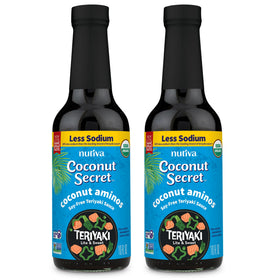 Coconut Secret coconut aminos teriyaki sauce bottle being poured for marinades and stir-fries