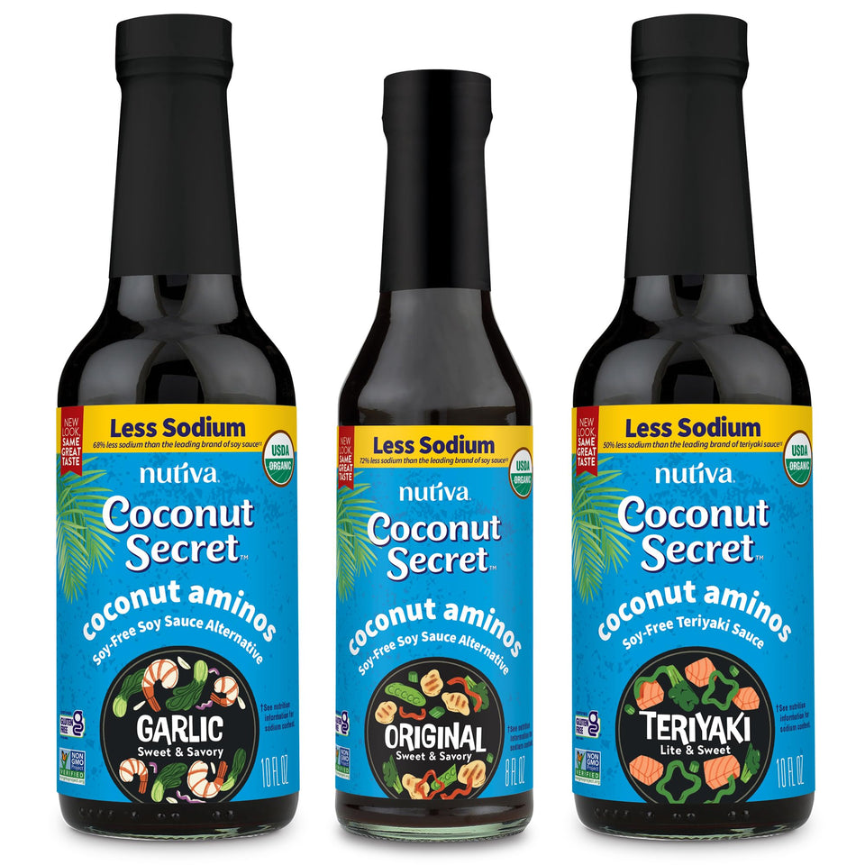 Coconut Secret Original Coconut Aminos bottle pouring, savory umami with reduced sodium.