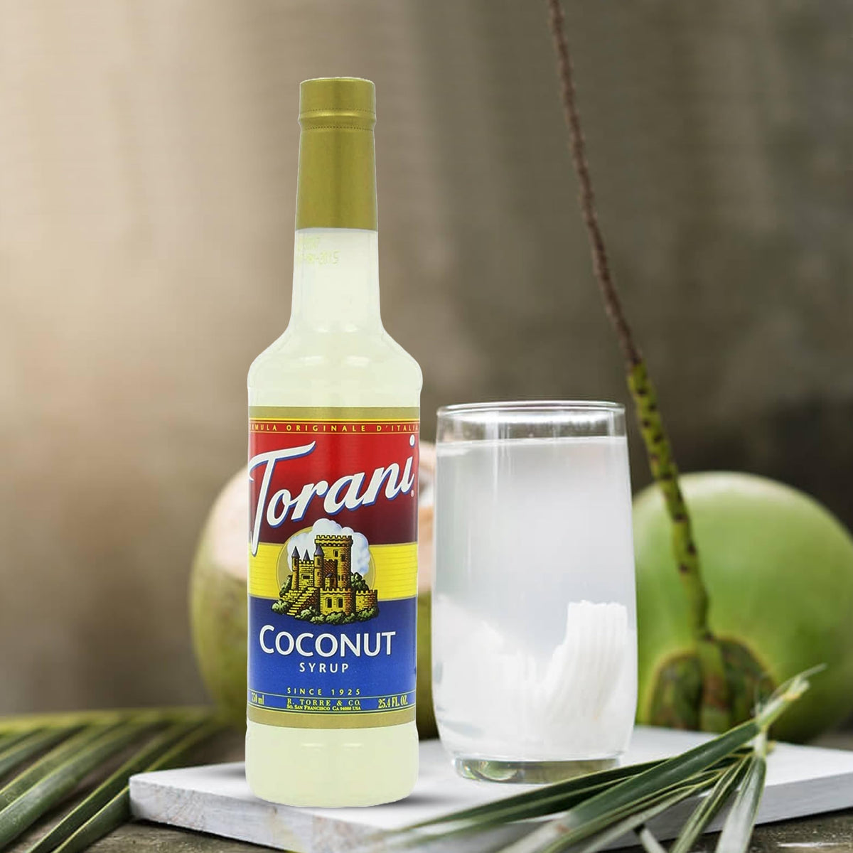 Coconut syrup swirl in a coffee drink enhances tropical aroma.
