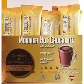 Cup of CocoRinga Moringa Hot Chocolate ready to mix smoothly.