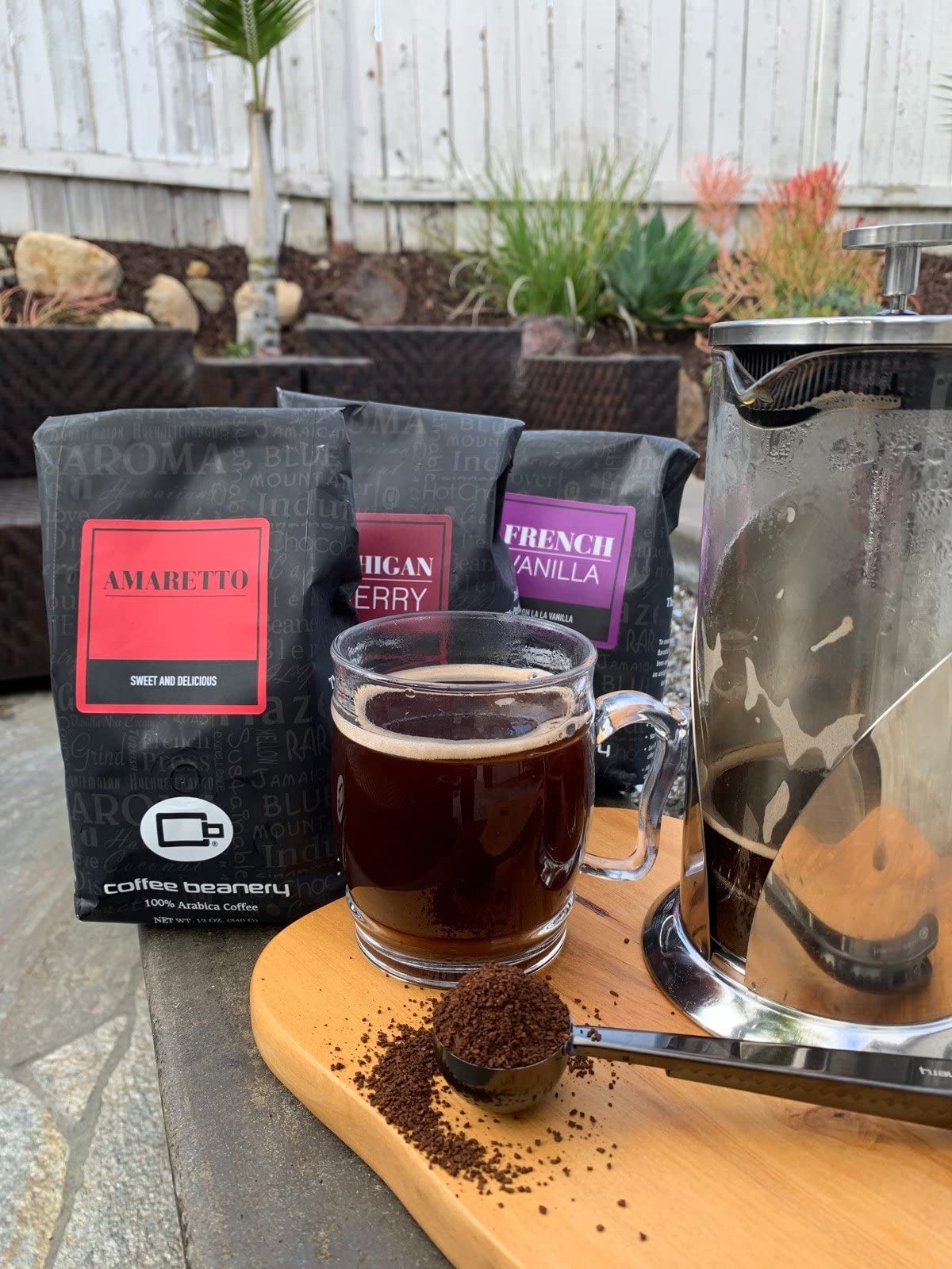 Coffee Beanery Michigan Cherry brewed cup with steam and inviting aroma