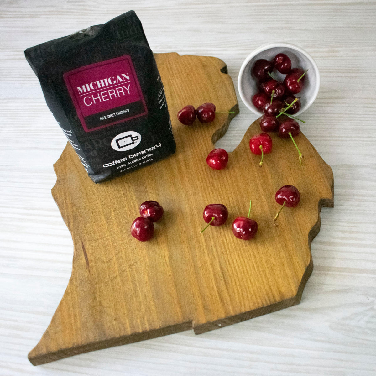 Coffee Beanery Michigan Cherry whole bean close-up revealing aromatic quality.