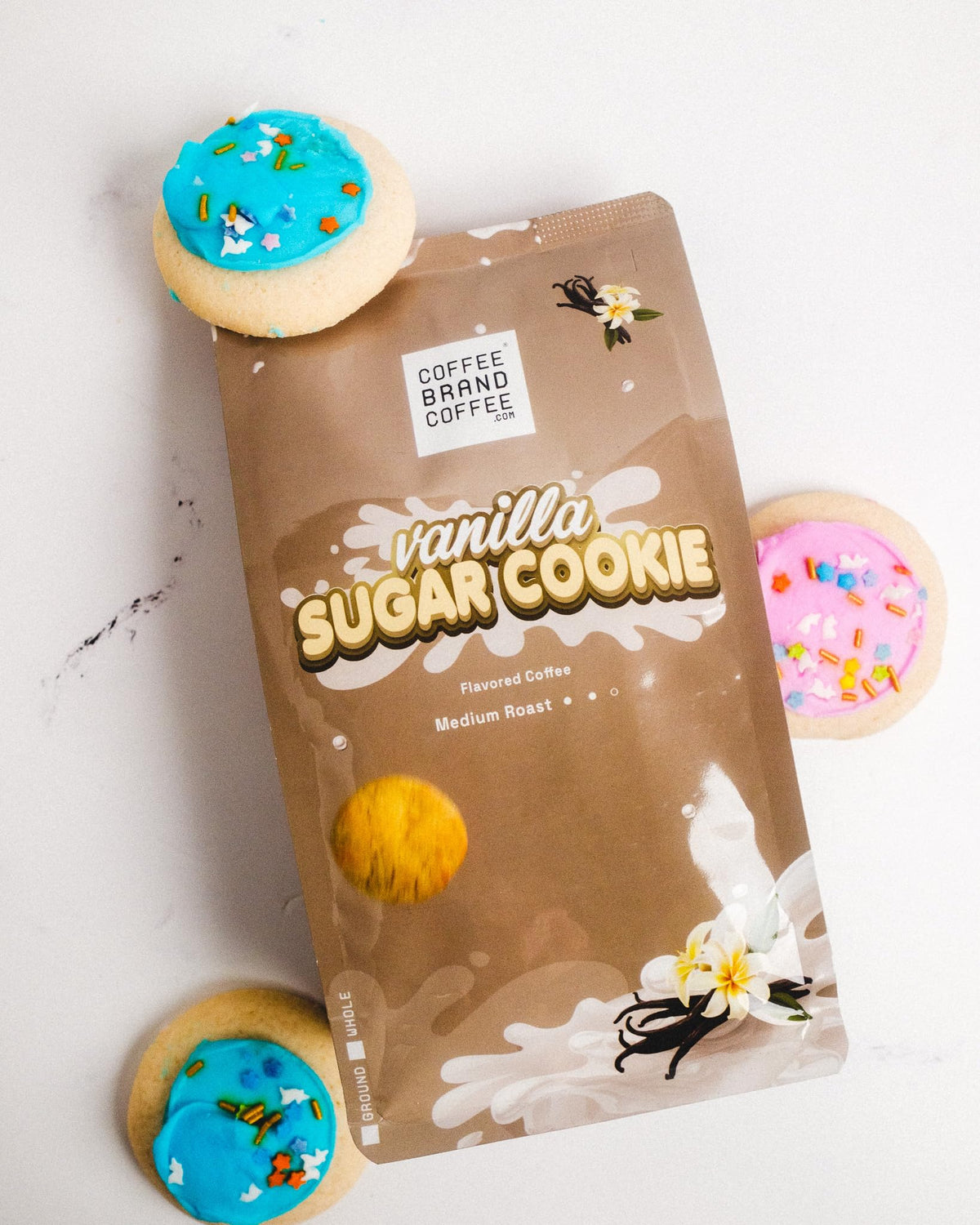 Steam rising from Coffee Brand Coffee vanilla sugar cookie cup