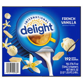Coffee cup with International Delight French Vanilla creamer for a creamy sip.