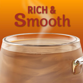 Pouring Coffee Mate Cafe Collection Caramel Macchiato into a cup of coffee.
