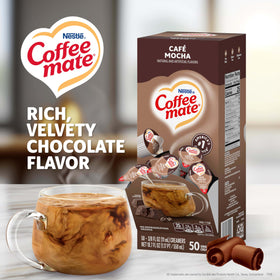 Coffee Mate Café Mocha singles being poured into a cup of coffee