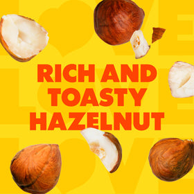 Coffee Mate Hazelnut liquid creamer swirls in a mug for velvety texture
