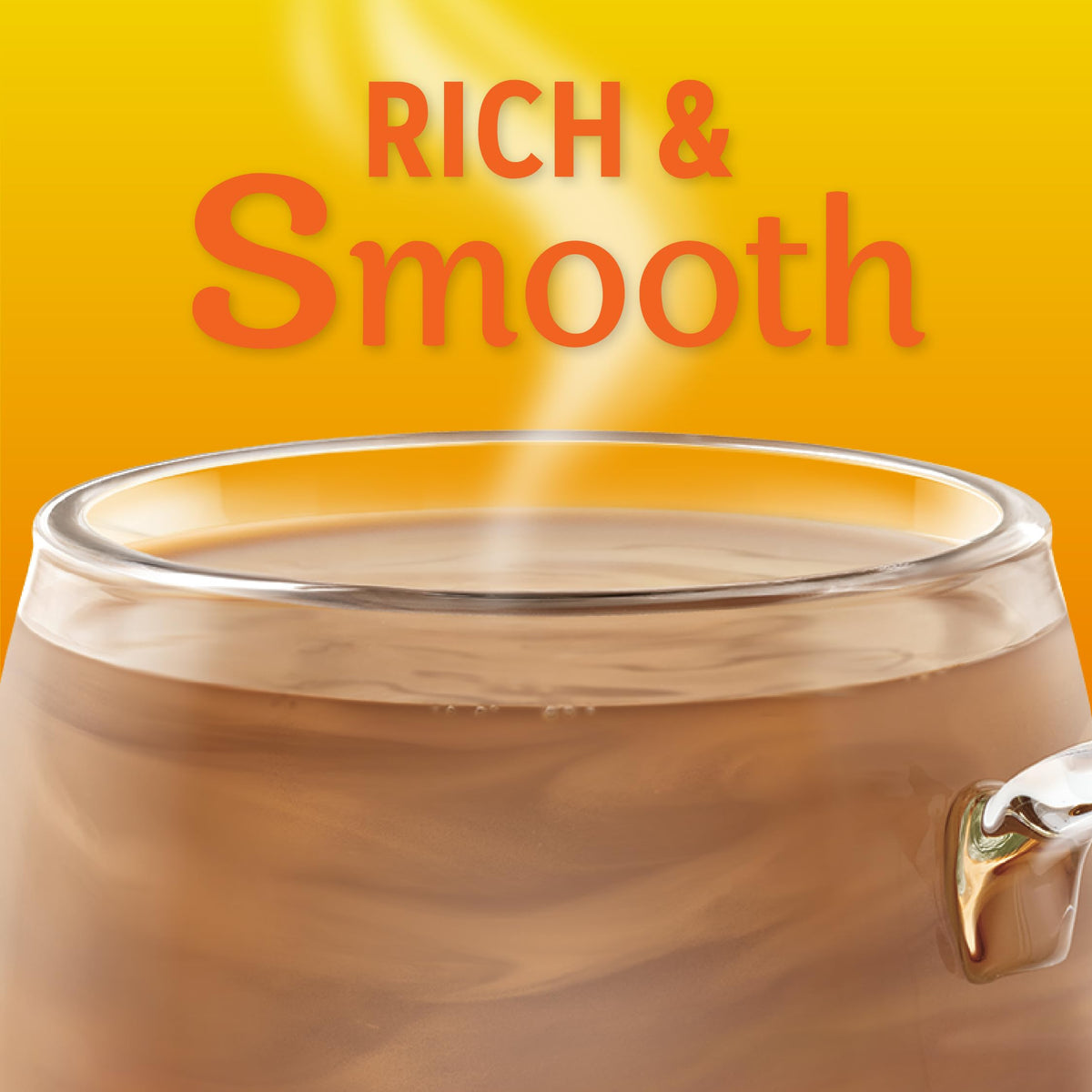 Coffee-mate Hazelnut powder creamer canister shown with measuring spoon for precise flavor