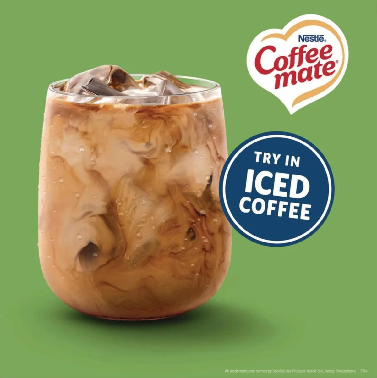 Coffee-mate Irish Creme cup open close-up shows smooth texture for enhanced coffee.