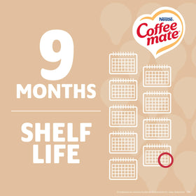 Coffee Mate Office break-room display with bulk liquid creamer singles.