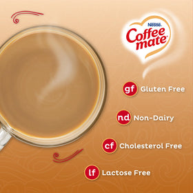 Coffee Mate Original fat-free powder dissolving in hot coffee for smooth blend