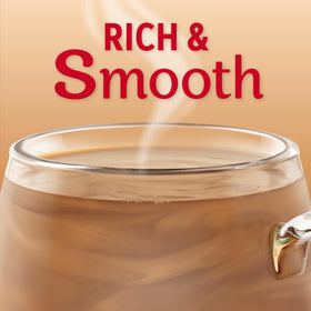 Close-up of Coffee Mate Original Fat Free Creamer label highlighting non-dairy formula