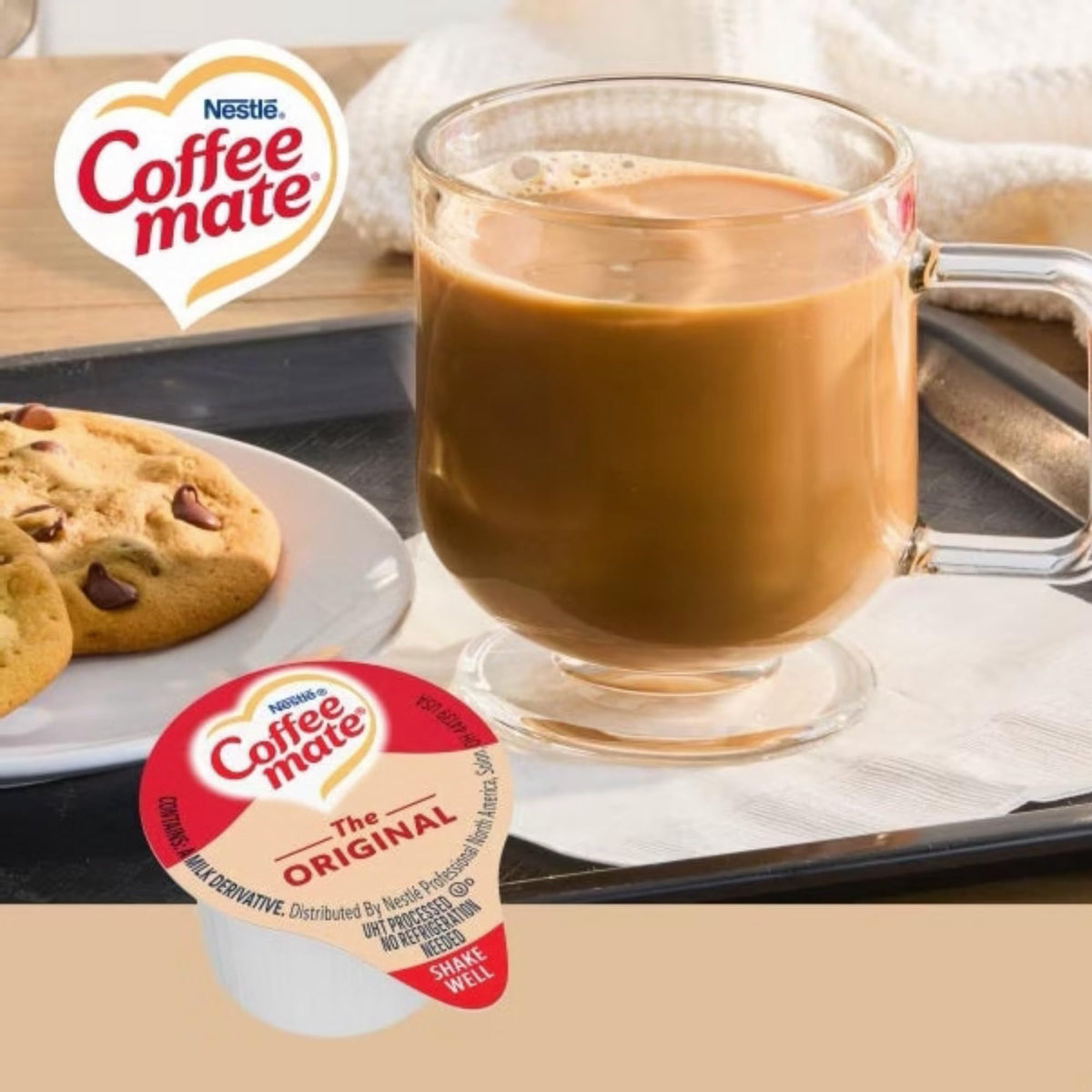 Two boxes of Coffee mate Original creamer singles showing 100 servings total