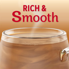 Coffee Mate Original Powdered Creamer pouring into coffee to create creaminess