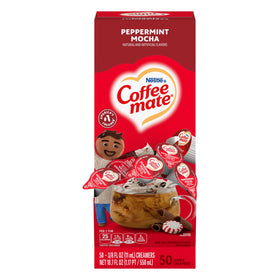 Coffee mate Peppermint Mocha creamer box on a clean counter, convenient seasonal flavor.