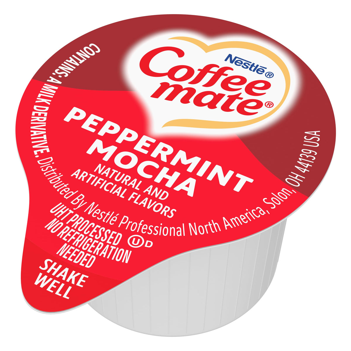 Coffee mate dispenser box close-up highlighting mess-free, portable single-use packaging.