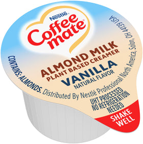Coffee Mate Plant-Based Creamer bottle highlights smooth vanilla flavor.