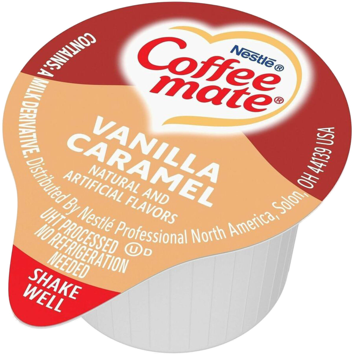 Close-up of coffee with Vanilla Caramel creamer dissolving smoothly.