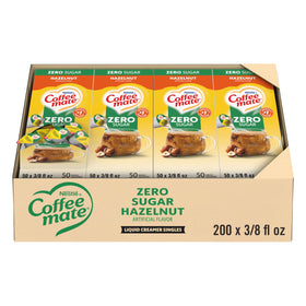 Coffee Mate Zero Sugar Hazelnut creamer tub on a dispenser box, ideal for quick coffee prep.