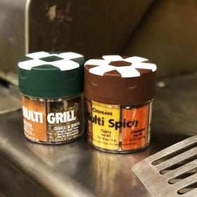 Coghlan's Multi-Grill Shaker with flip-top lid enables mess-free seasoning on the go.