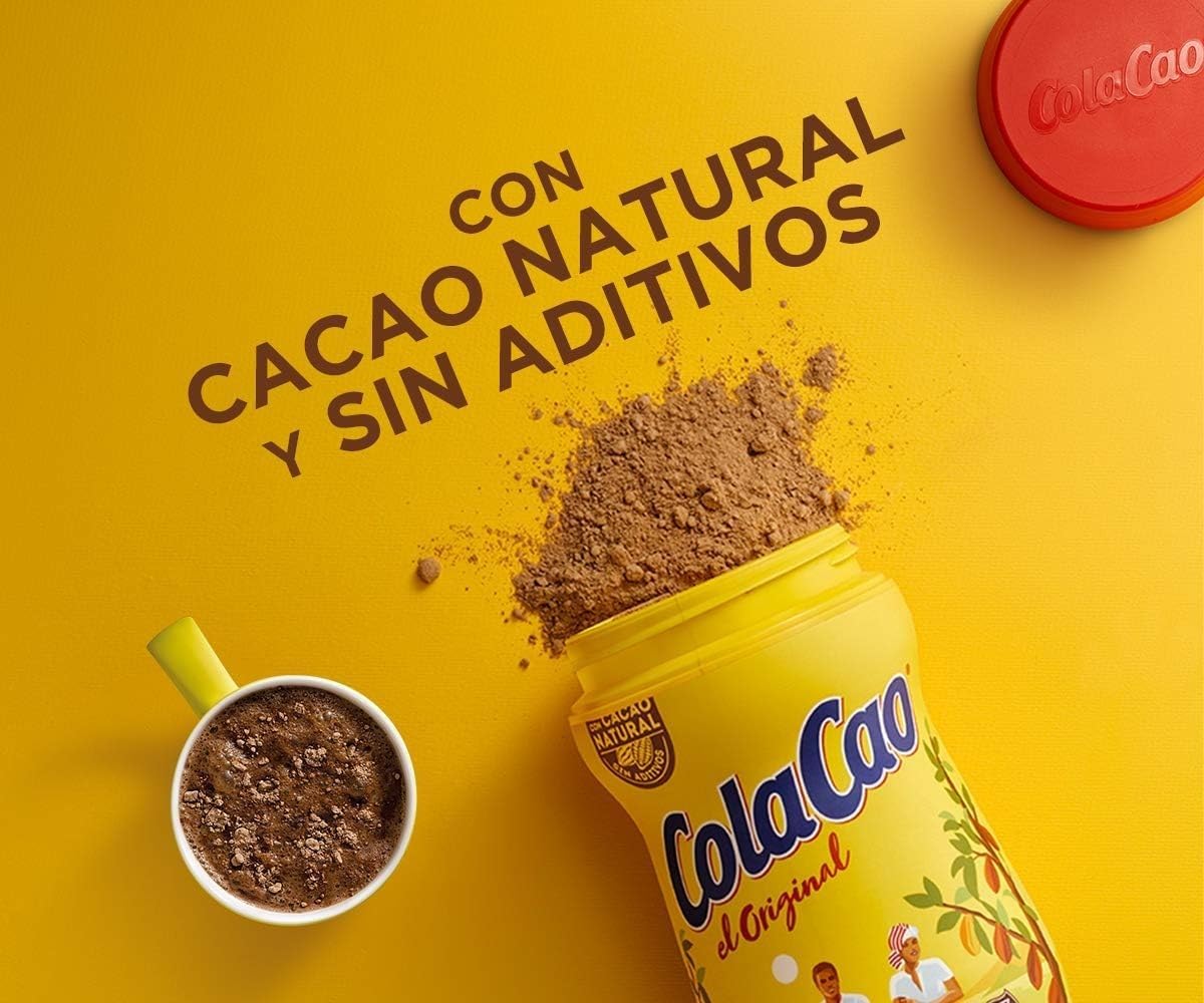 Cola Cao frothy cocoa top on a mug ready to sip.