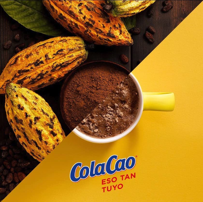 Cola Cao original chocolate drink mix with kids at table for a comforting snack.