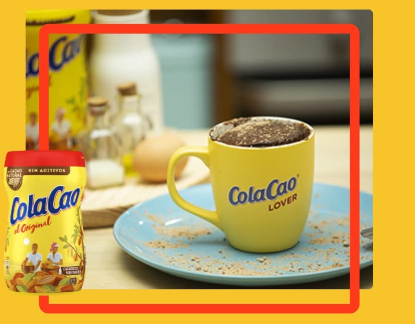 Cola Cao original chocolate drink mix packaging closeup highlighting ingredients quality.