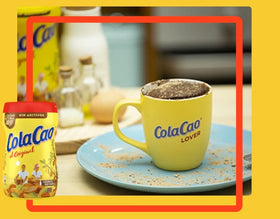 Cola Cao original chocolate drink mix packaging closeup highlighting ingredients quality.